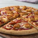 Chicken Nugget Pizza with Red Onion and BBQ Drizzle