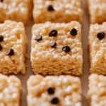 Close-up of Rice Krispie Treats topped with chocolate chips