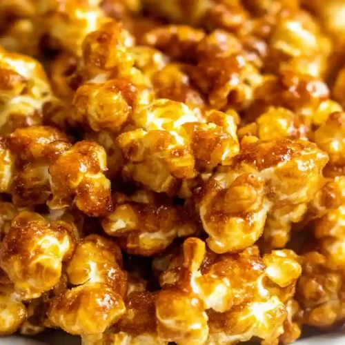 Crunchy homemade caramel popcorn coated in golden brown caramel without corn syrup
