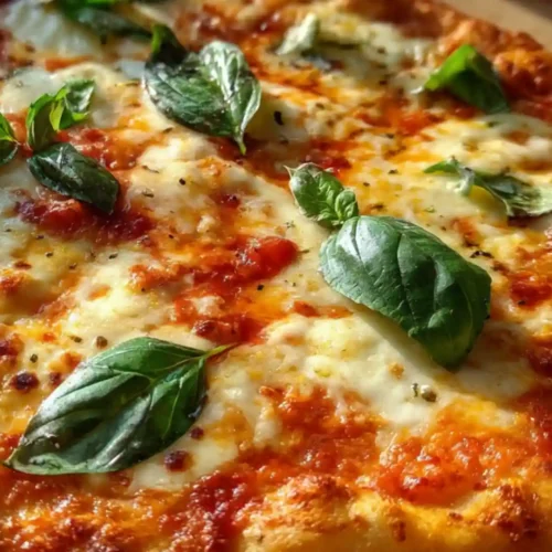 Margherita pizza with melted mozzarella, fresh basil, and golden crust on a wooden board