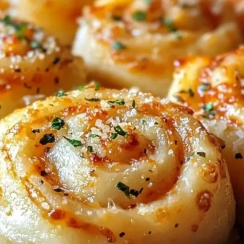 Delicious Garlic Parmesan Pizza Rolls styled like New York pizza rolls.